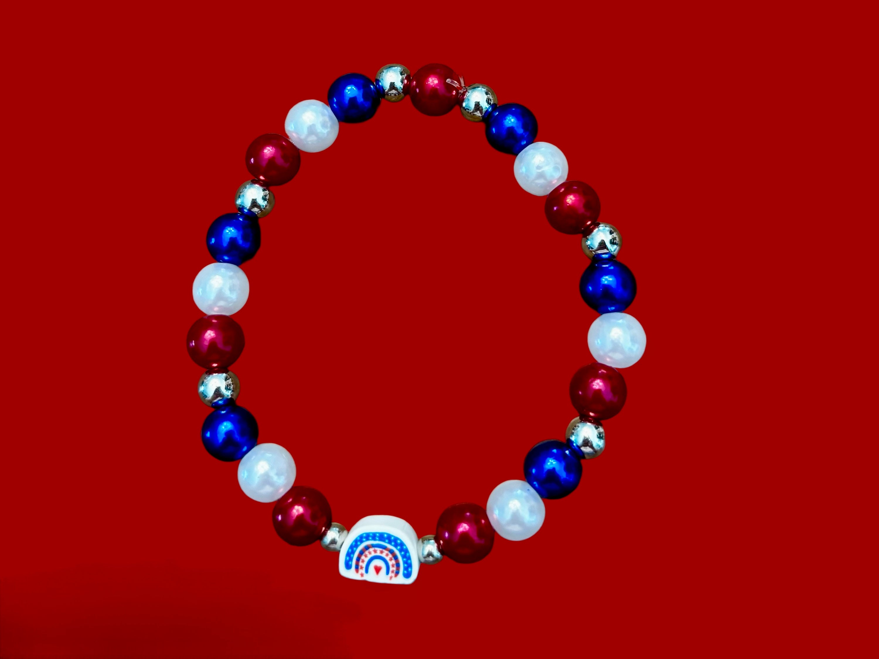 Red white and blue shape charm bracelets